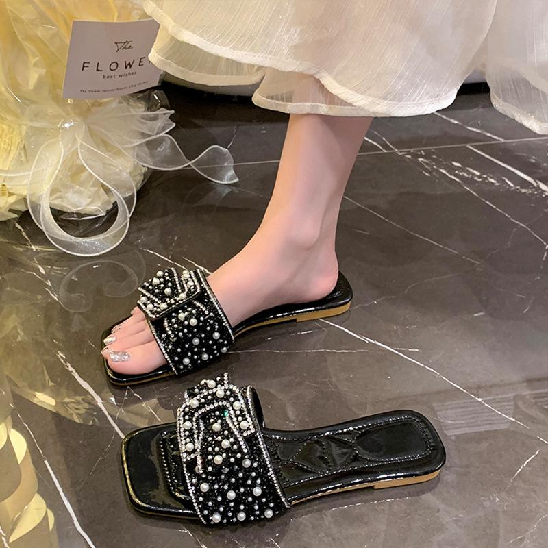 Internet celebrity slippers women wear 2025 summer new rhinestone bow large size beach with skirt one word cool slippers