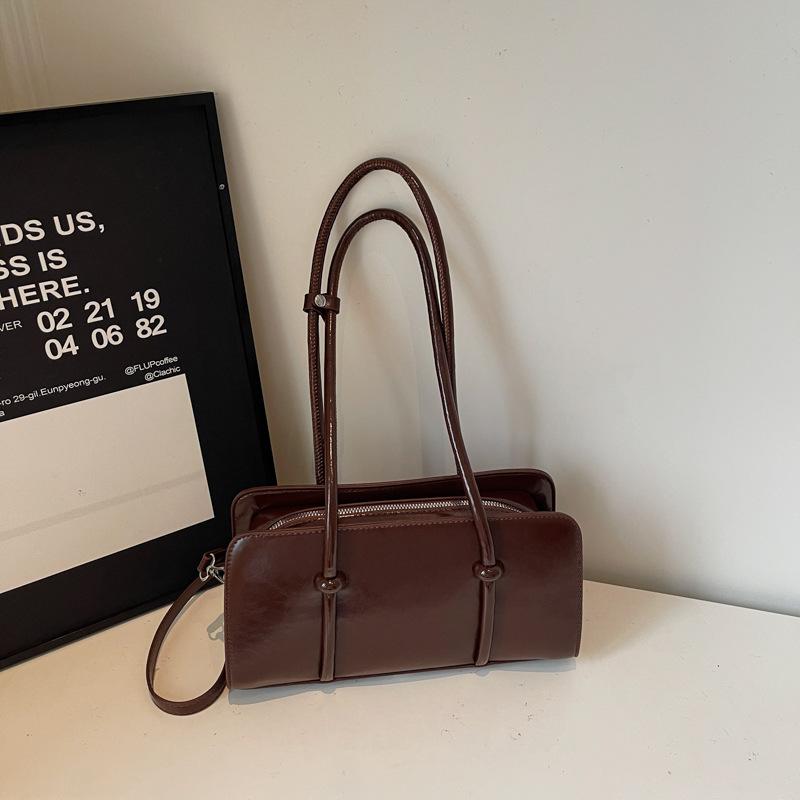 

Retro bag women s large capacity 2025 new autumn and winter versatile shoulder underarm bag casual texture commuter pillow bag коричневый