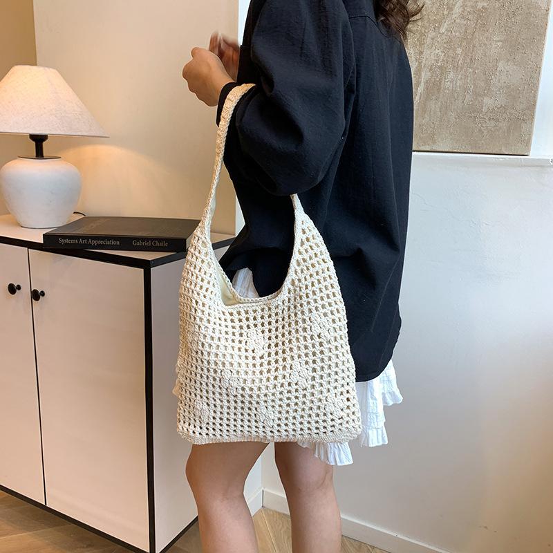 Niche hollow bucket bag women's summer new fashion woven beach bag leisure vacation shoulder bag