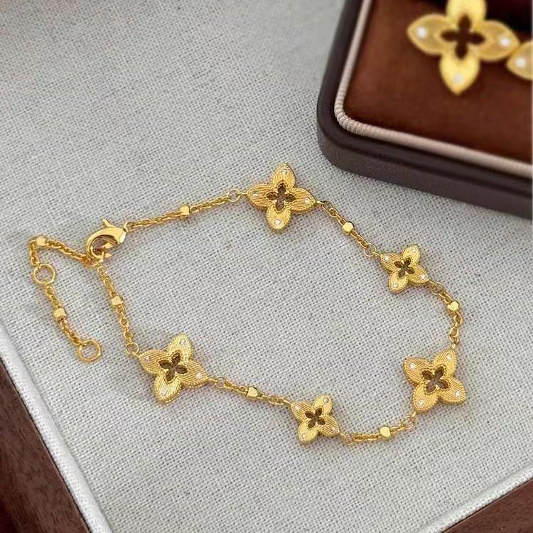 TikTok-Style Four-Leaf Clover Diamond Bracelet: Women's Luxurious Gold-Tone Titanium Steel Jewelry