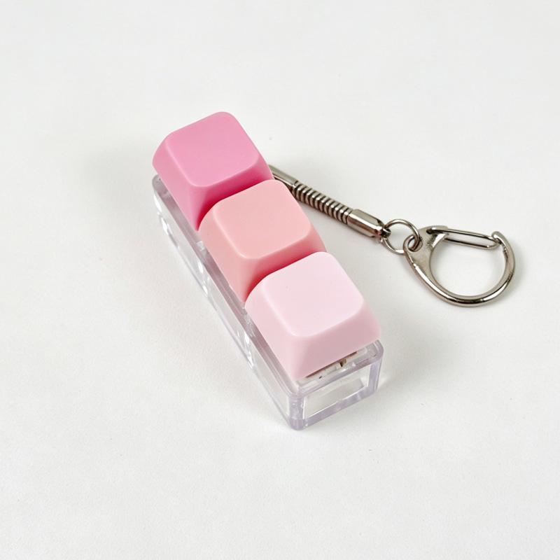 Sleutelhanger voor stressverlichting: Decompressie Kubus met Vier Knoppen & Toetsenbord Hanger