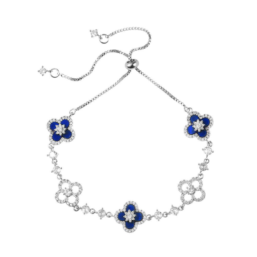 Náramek se čtyřlístkem z imitace perleti a diamantů - Dutý a třpytivý design se stahovací šňůrkou, Lehký luxusní módní ruční šperk.