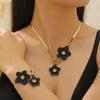 Elegant Alloy Flower Pendant Necklace and Earrings Set for Women - Fashionable, High-End, and Versatile.