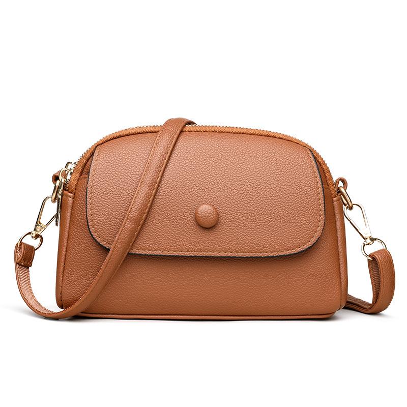 

Универсальная нишевая сумка-мессенджер из коровьей кожи с текстурой