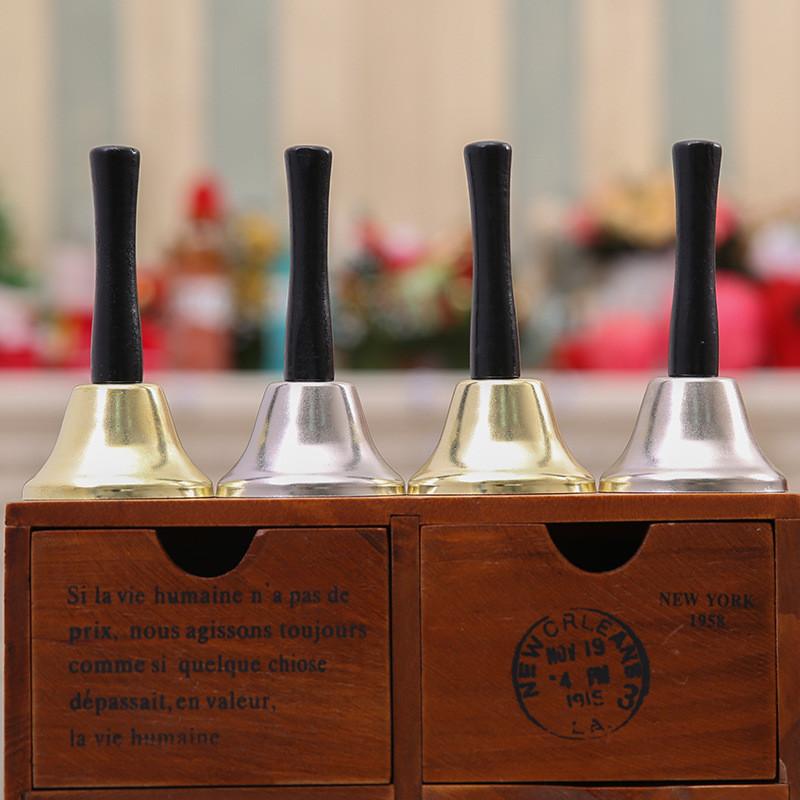 Festive Christmas Santa Handbell Toy With Joyful Gold And Silver Colors For Holiday Cheer