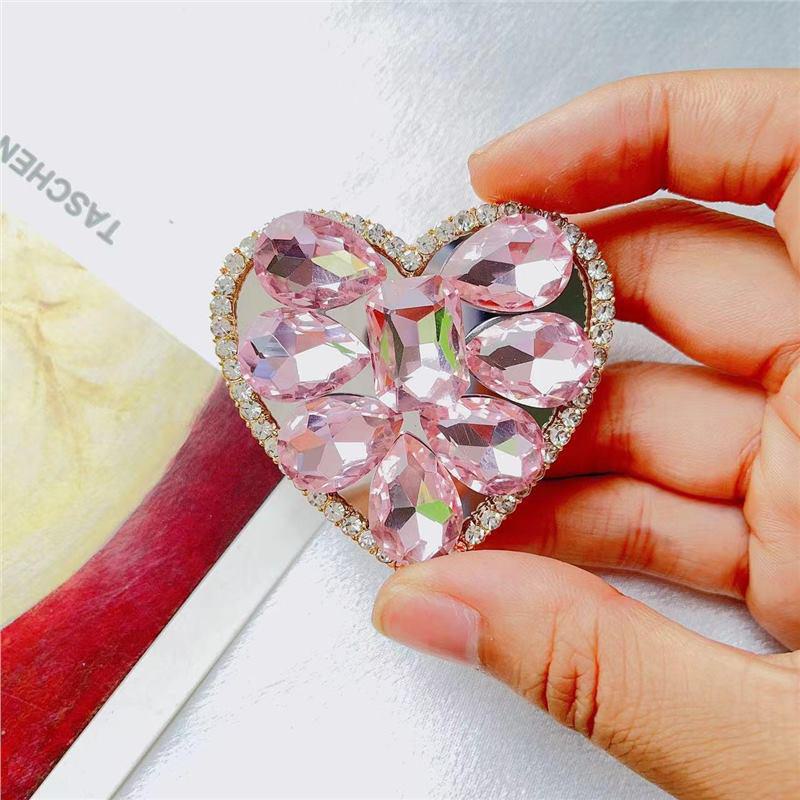 

Универсальный чехол для телефона с телескопическим держателем Diamond Heart Crystal розовый