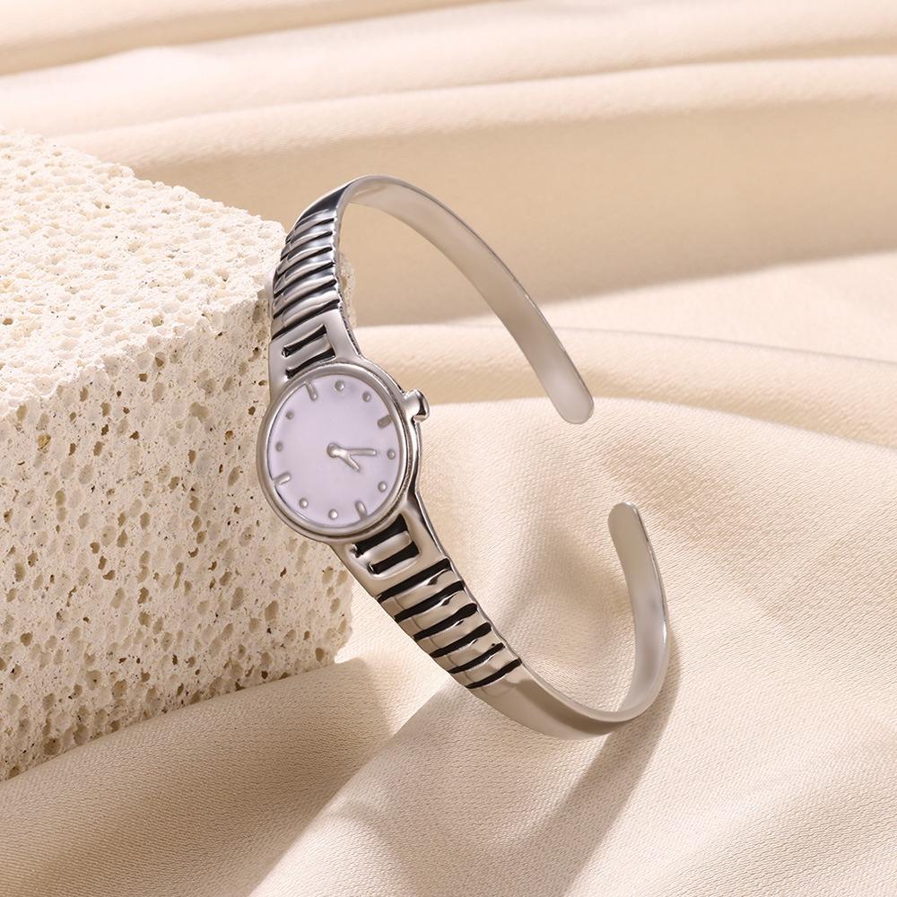 

Creative Open Bracelet Clock Titanium Steel Hand Chain Jewelry Watch Design Bangle Unisex срібний