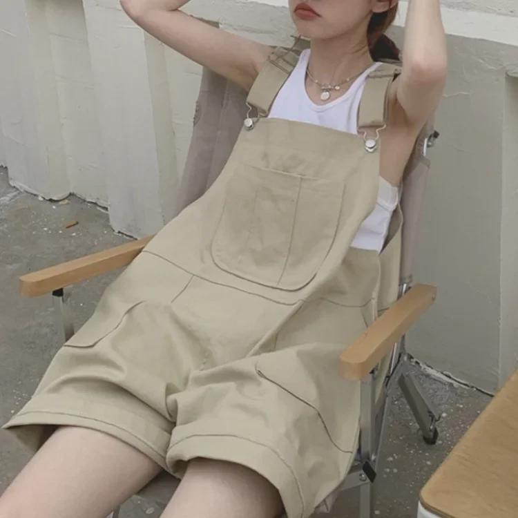 Dámské khaki bavlněné zeštíhlující volné overaly s velkými kapsami - Letní široké šortky na ramínka