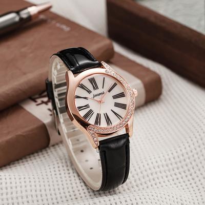 Moderne und hochwertige Damen-Quarzuhr mit rundem Zifferblatt, römischer Zifferenskala und exklusivem Lederarmband.