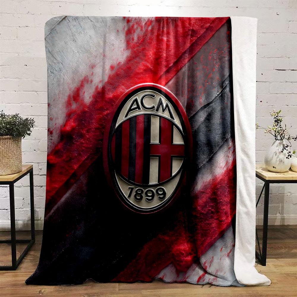 Red and black textured diagonal streaks with a central oval emblem. for all seasons blanket lunch break throw gift