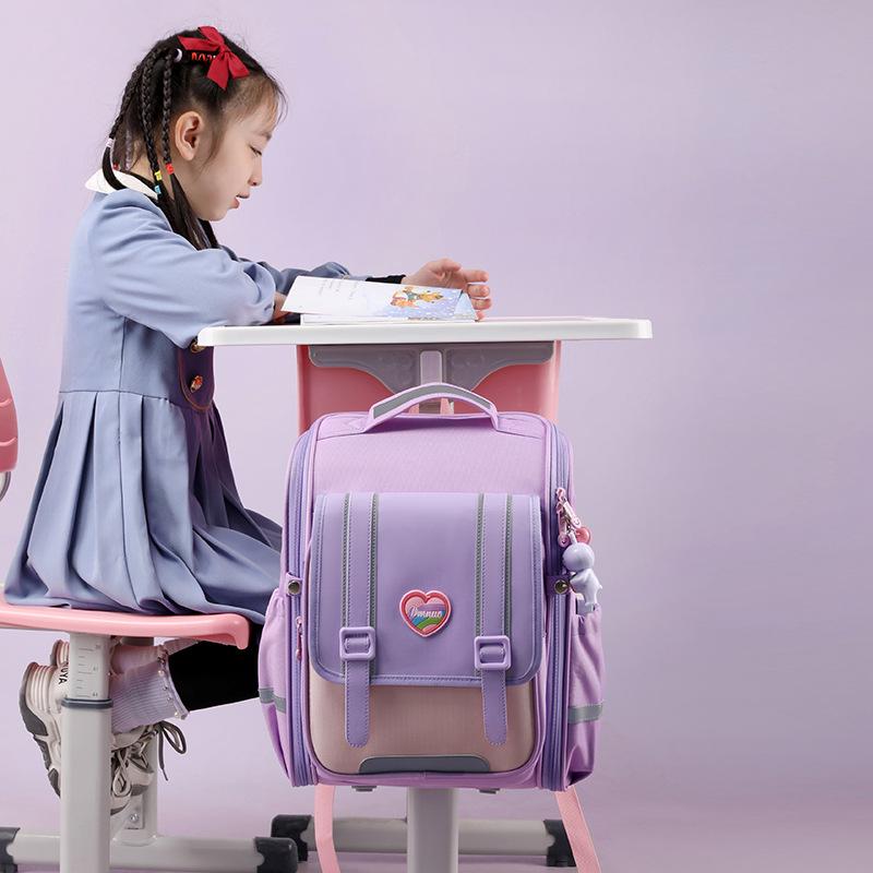 New health care ridge vertical version large-capacity integrated student backpack, primary school bag, grade 3-6 backpack
