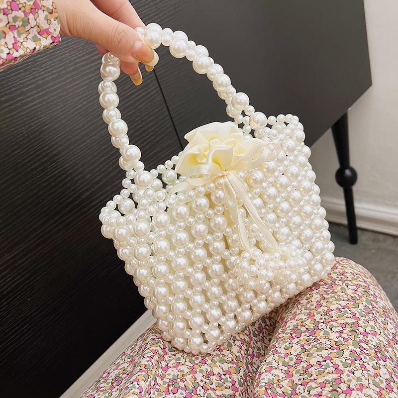 Spring beaded retro fashion sweet pearl hand strap personality trend shoulder personality messenger women's bag