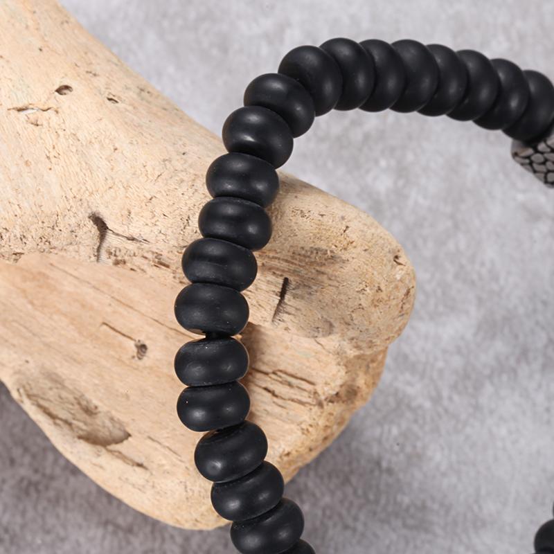 REPTILE AGATE STONE BRACELET matt black onyx bracelet in 8mm abacus shape with stainless steel reptile cube design element