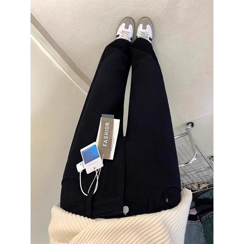 

Женские зимние джинсы больших размеров черного цвета на флисовой подкладке с высокой посадкой и прямыми штанинами M