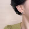 Fashion texture sense European and American style cross earrings design sense personality versatile curved fishtail high sense earrings