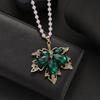 Korean Fashion Flower Sweater Chain Necklace - Autumn/Winter Women's High-End Cat's Eye Camellia Pendant.