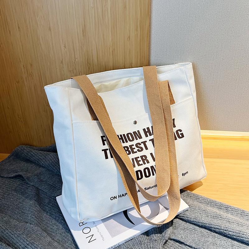 Fashionable Canvas Tote Bag For Students Stylish Large Capacity Shoulder Bag In Black White Or Khaki
