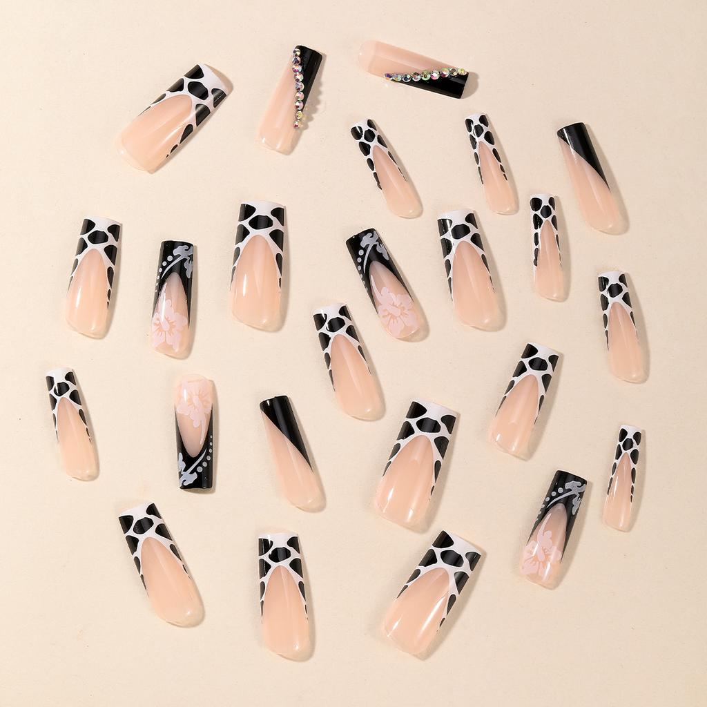 24Pcs Long Duck Flare Press On Nails, Nude with Pink Black Cow Print French Tips & Flower Rhinestone Fake Nails