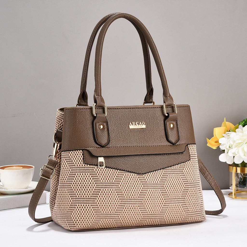 Stylish Women's Tote Bag In Elegant Black And Earthy Tones With Chic Design Features