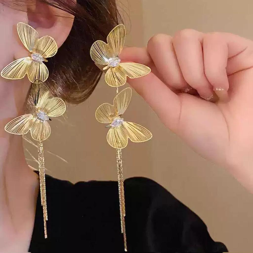 Silver Rhinestone Fishtail Tassel Earrings: Exaggerated Flower Design for a Stylish Look.