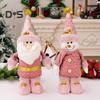 Christmas Plush Doll Telescopic Leg Elk Snowman Santa Claus Pink Doll Toy Desktop Figurine for Indoor/Outdoor Use Party Decor