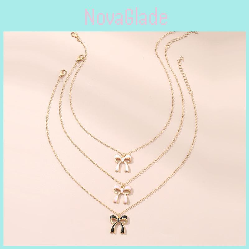 Feminine Legierung Schmetterling Schleife Halskette Mit Geometrischem Anhänger Für Frauen Modeschmuck