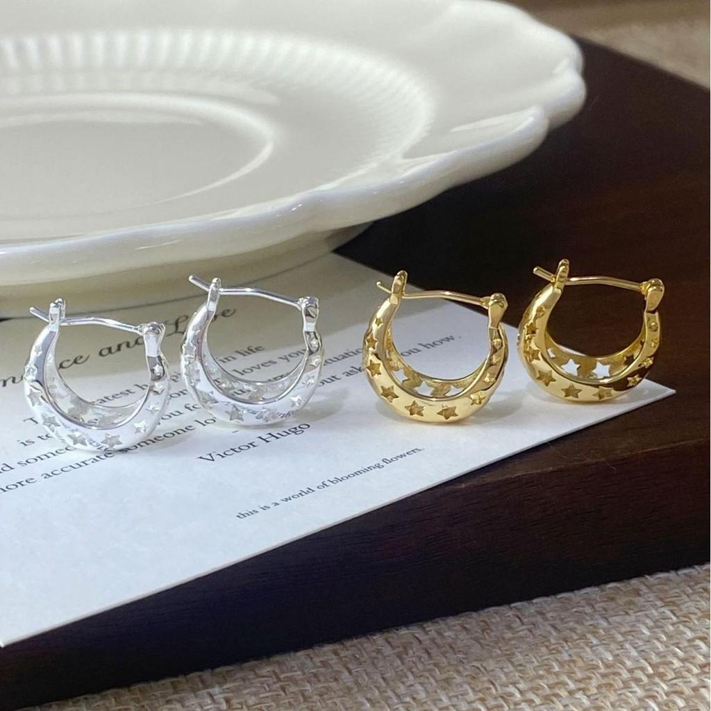 Schicke französische hohle Sternohrringe: Eleganter, vielseitiger Schmuck im Nischen-Cool-Stil