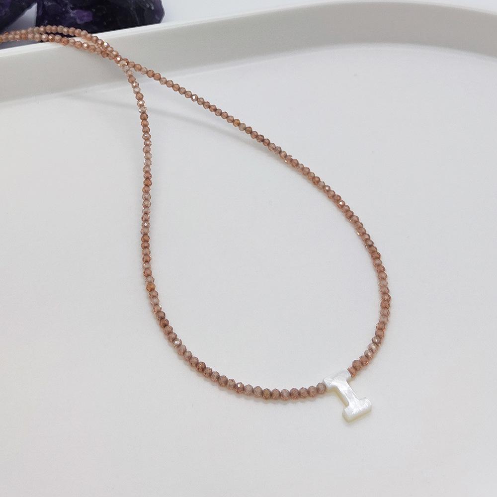 Elegant 2m Zircon Beaded Clavicle Chain: 26-Letter Deep Sea Shell Necklace for Women.