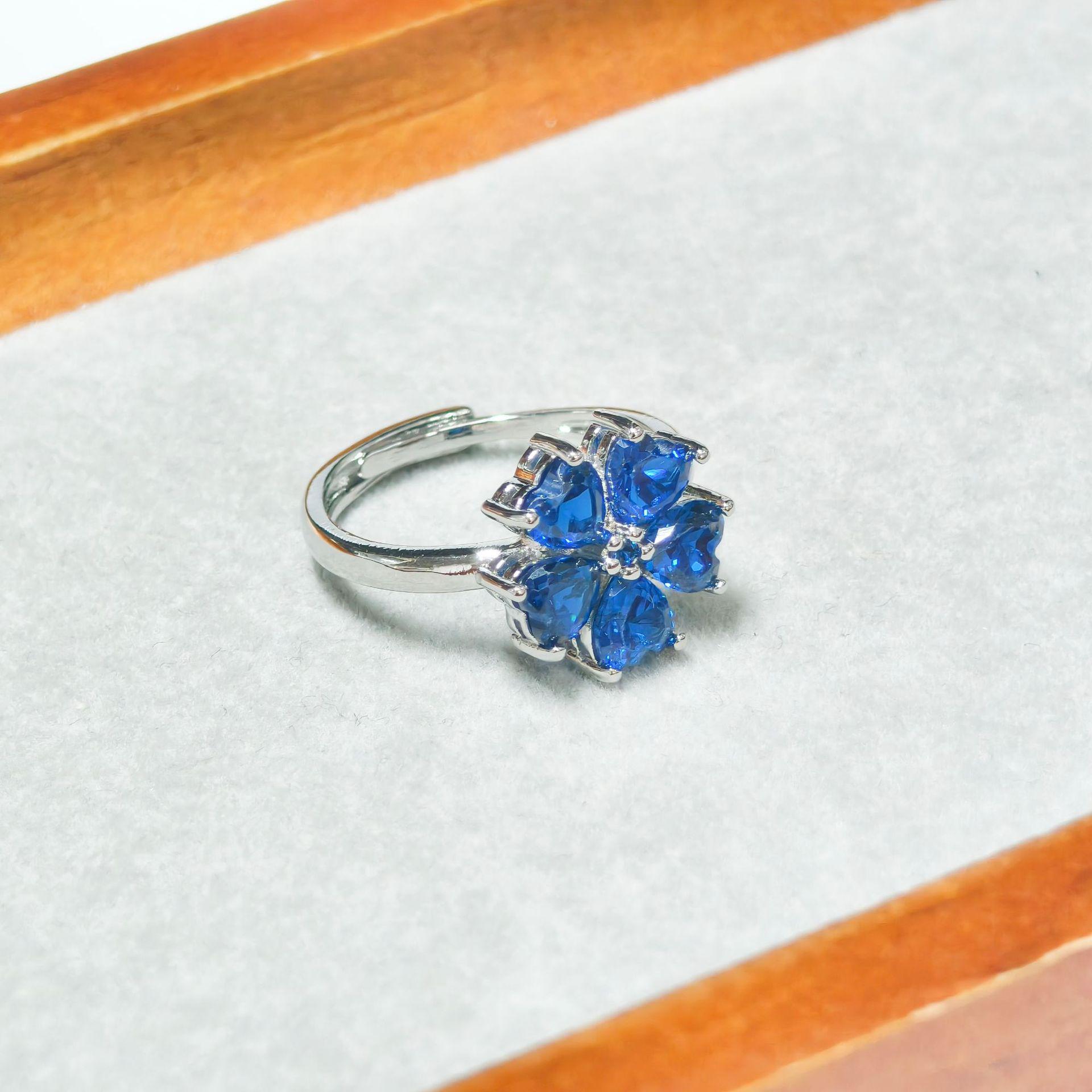 Gessen Jewelry Elegant Blue Flower Petal Stud Earrings, Ring, and Pendant Set for Women.
