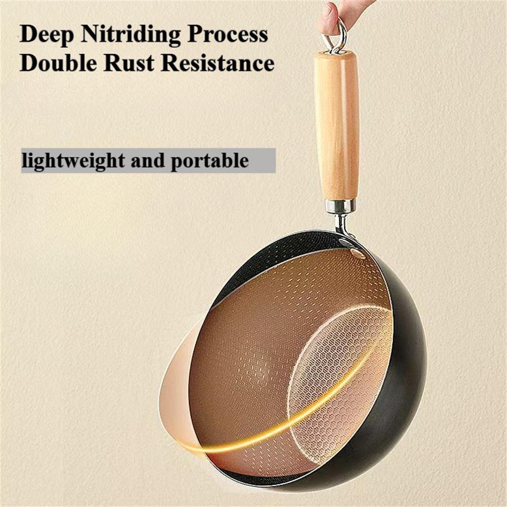 A deep circular, stir fry iron pan, uncoated and non stick pan, compatible with induction cookers