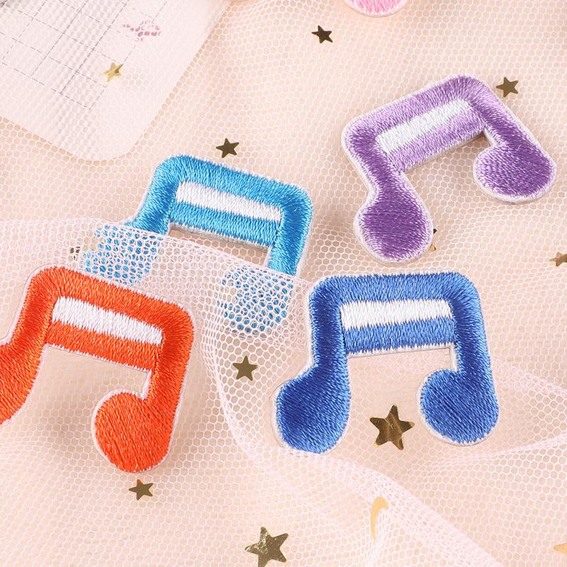 Borduurlabel cartoon muzieknoot stoffen label kledingaccessoires handboek DIY zelfklevende borduurstof sticker