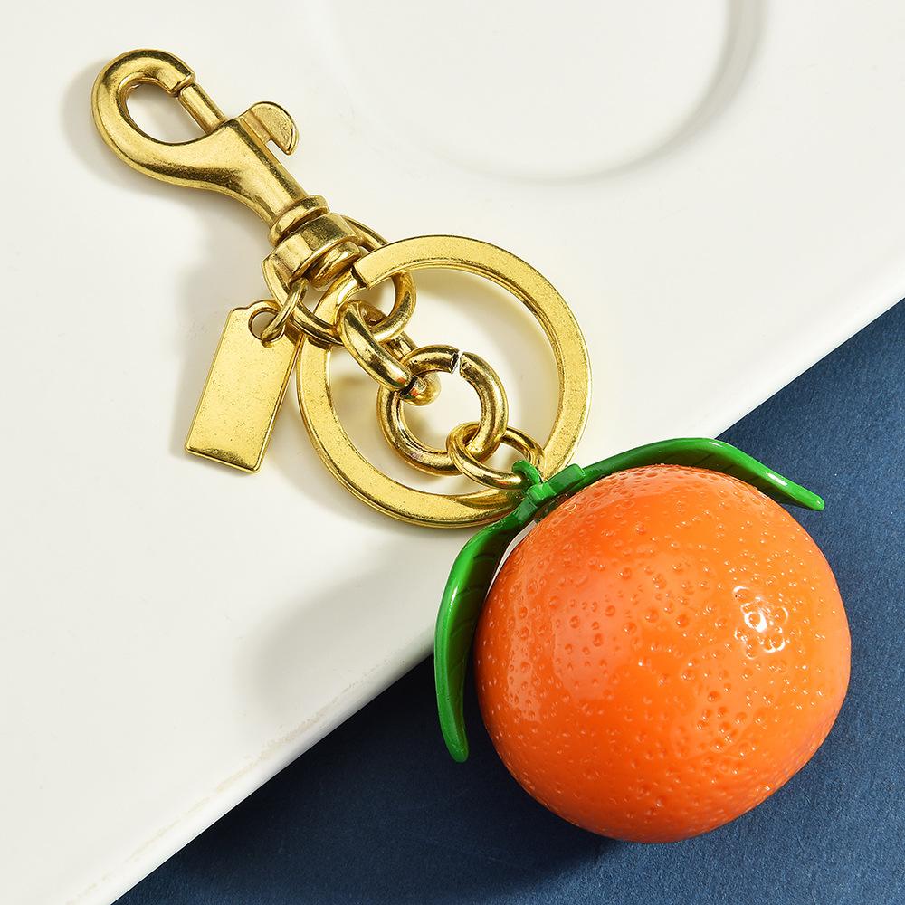 Women's fruit key chains, fashionable and creative lemon and orange slice bag pendants, keychains