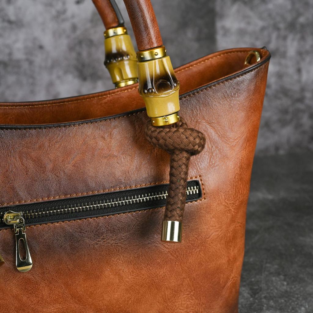 Johnature Retro geprägte Lederhandtasche Damentasche Fortschrittliche vielseitige Umhängetasche mit großer Kapazität