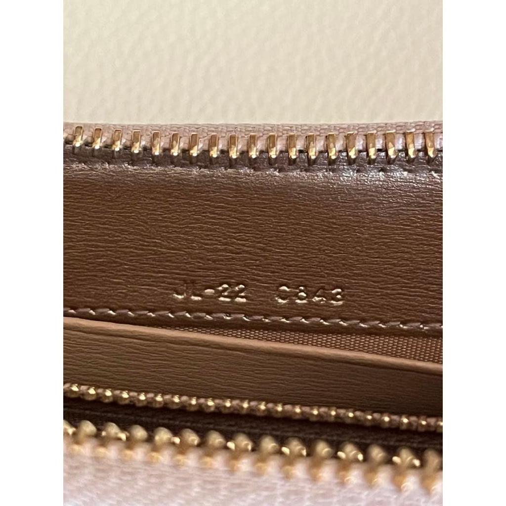 Used Excellent condition  Ferragamo long wallet, round zip, Gancini, leather, gold hardware