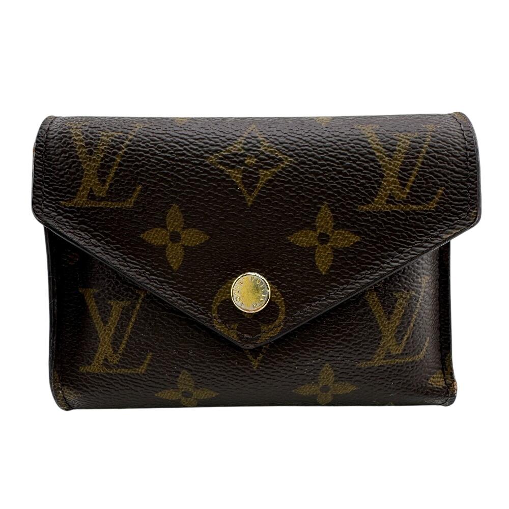 

Louis Vuitton M62472 Поставляється з гаманцем для монет Шкіра Monogram Портмоне Victorine Трискладний гаманець Коричнева шкіра Жіночий Вживаний