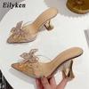Fashion Eilyken Fashion Style Crystal Bowknot Women Slippers Sexy Pointed Toe Strange Heels PVC Transparent Pumps Sandals Slides Shoes