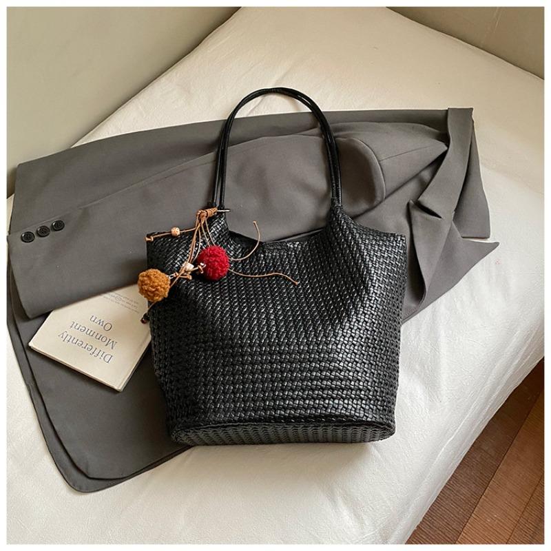 Autumn new texture braided pattern commuting simple large capacity retro solid color bucket armpit shoulder bag for women