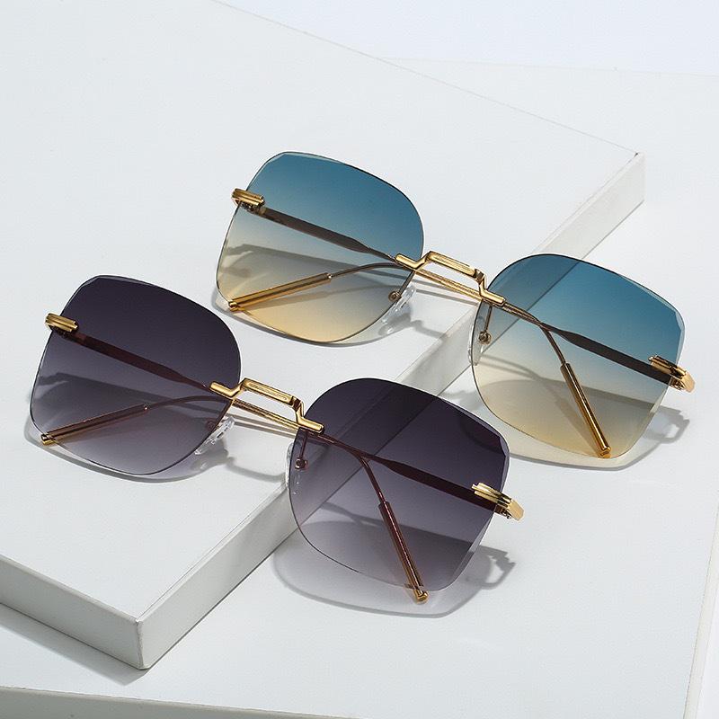 2025 Unisex Rimless Metal Sunglasses with UV Protection & Gradient Lenses