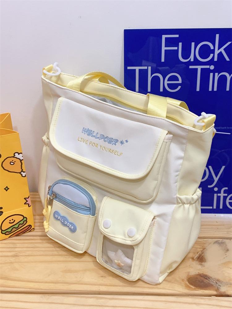Schoolbag Large capacity schoolbag Girls primary school students High value Small fresh color matching backpack Junior high school students Versatile