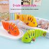 Wind-up Wiggling Fish Toy for Children - Fun Spring-powered Cartoon Animal Gift.