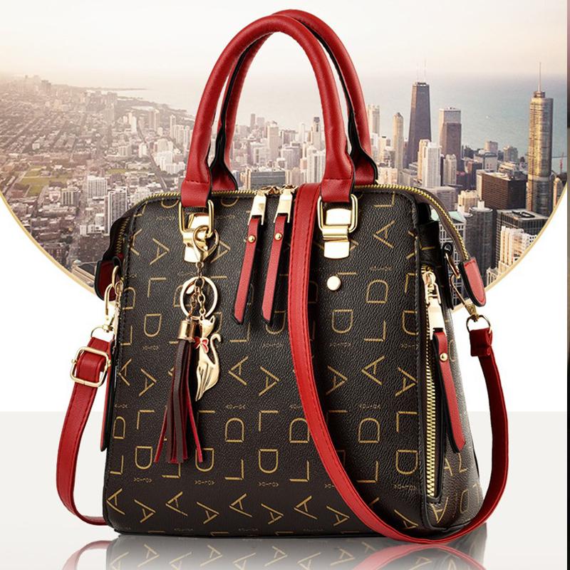 Stylish Womens Pu Leather Tote with Tassel Accent Top Handle and Shoulder Strap