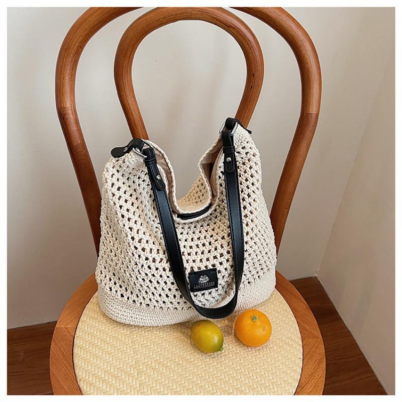Beach woven bag women's new hollow knitted handbag large capacity shoulder crossbody armpit bag