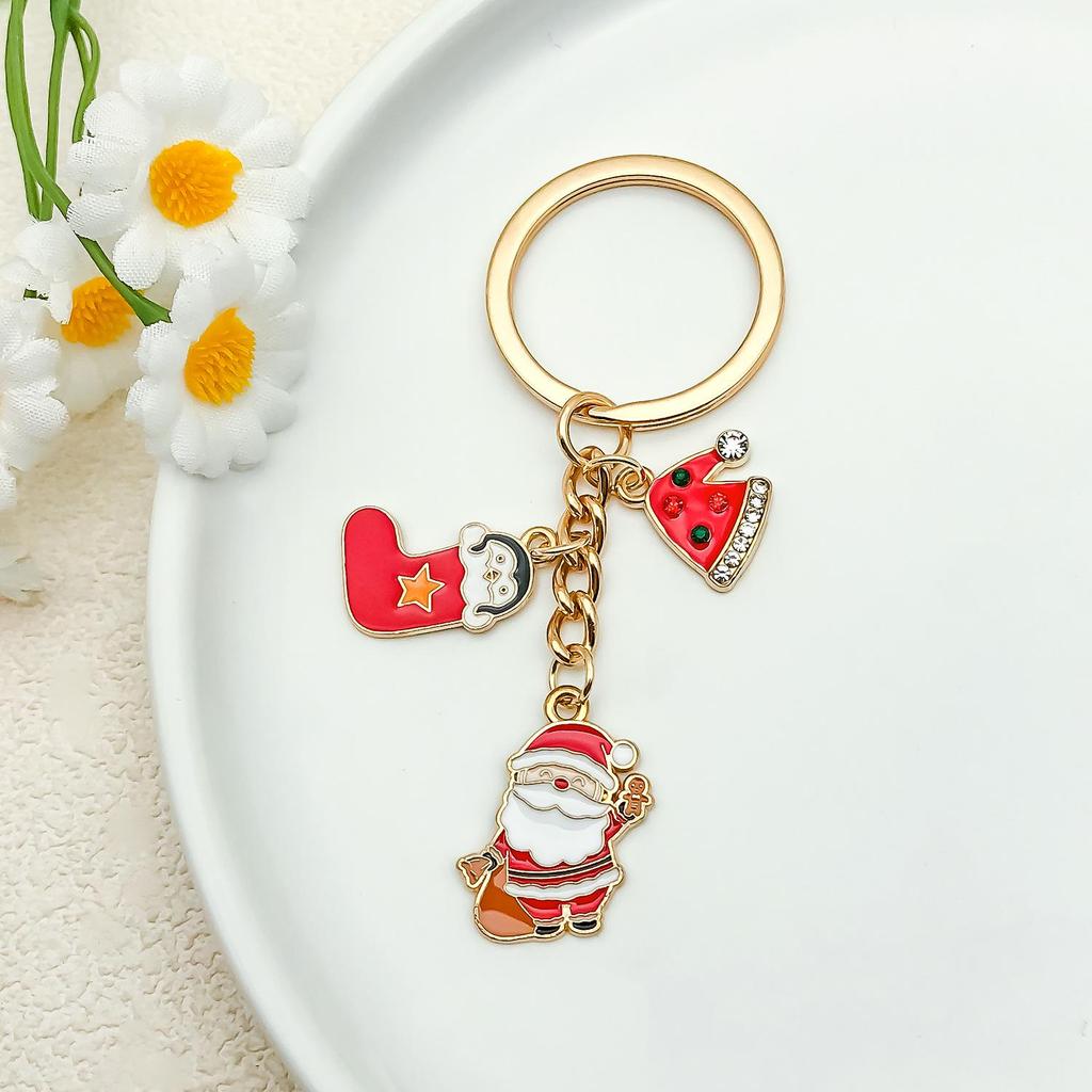 Elegant Christmas Keychain: Gold Snowflake & Snowman Pendant
