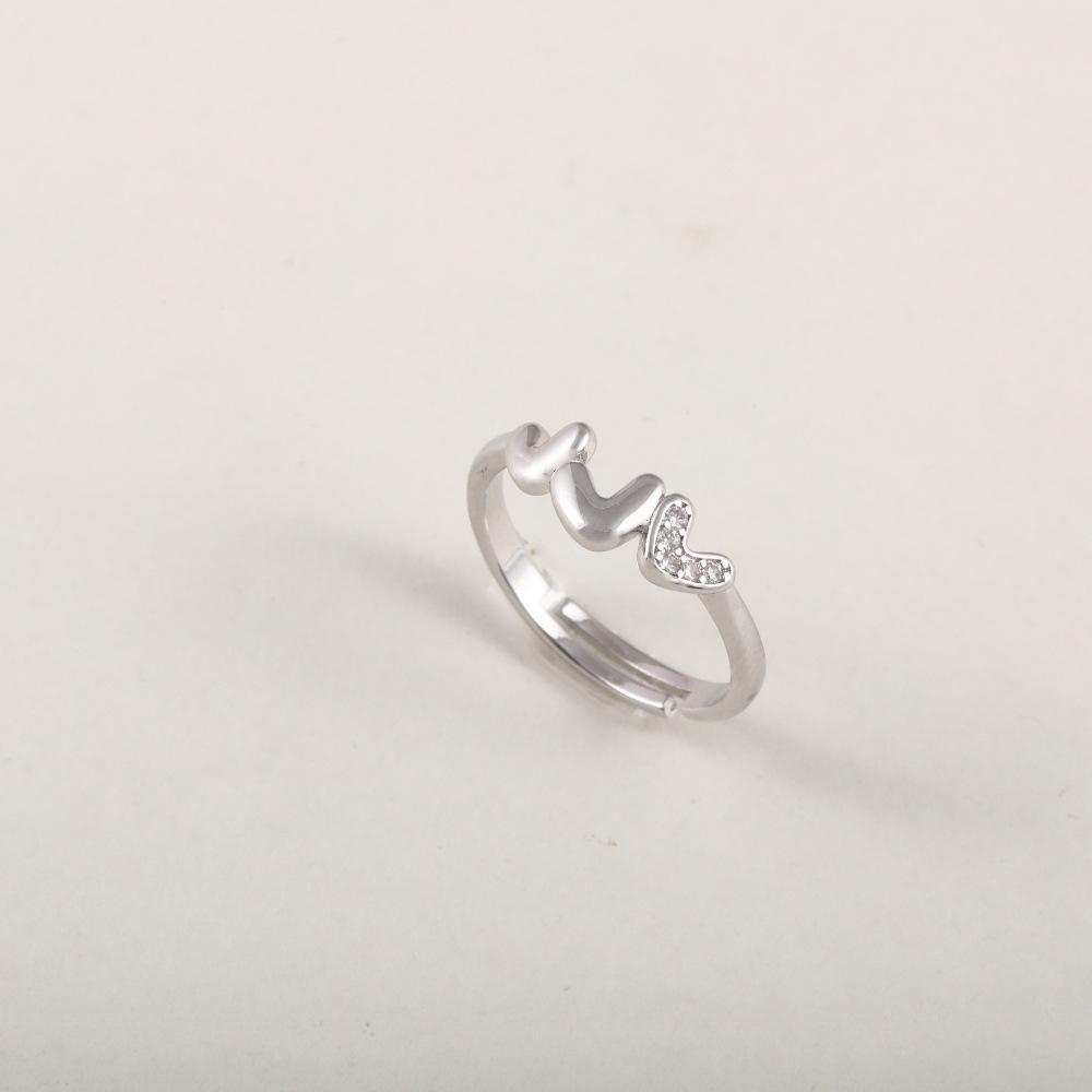 18 Karat Vergoldeter Herzförmiger Ring für Damen mit Mikrofassierten Zirkonia und Verstellbarem Dünnen Band