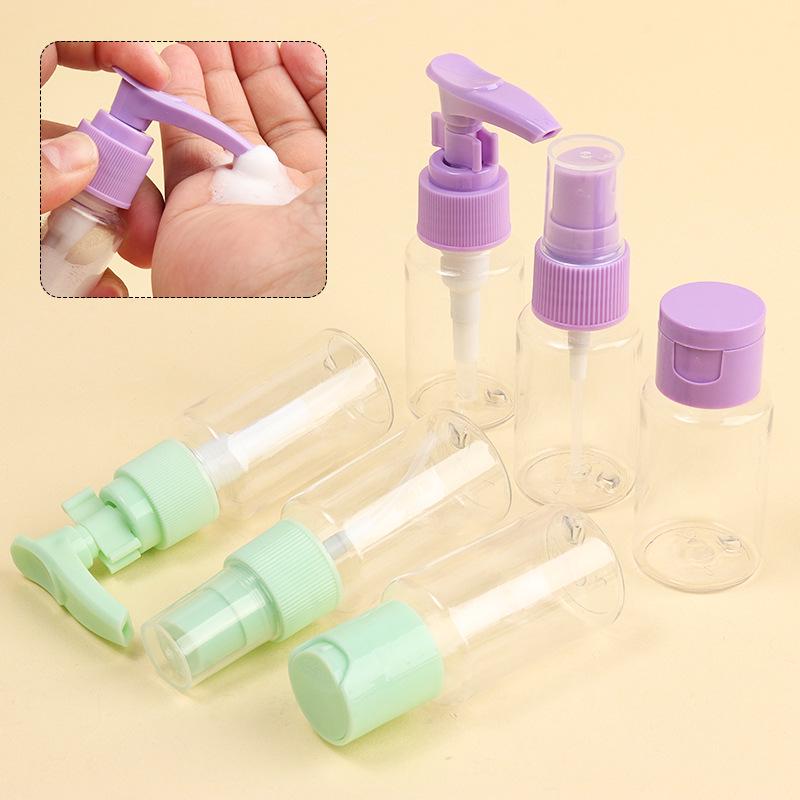 Set Portatile di 7 Flaconi Ricaricabili da Viaggio: Include Flaconi Spray, Contenitori per Lozioni e Creme per i Prodotti Essenziali per la Cura della Pelle