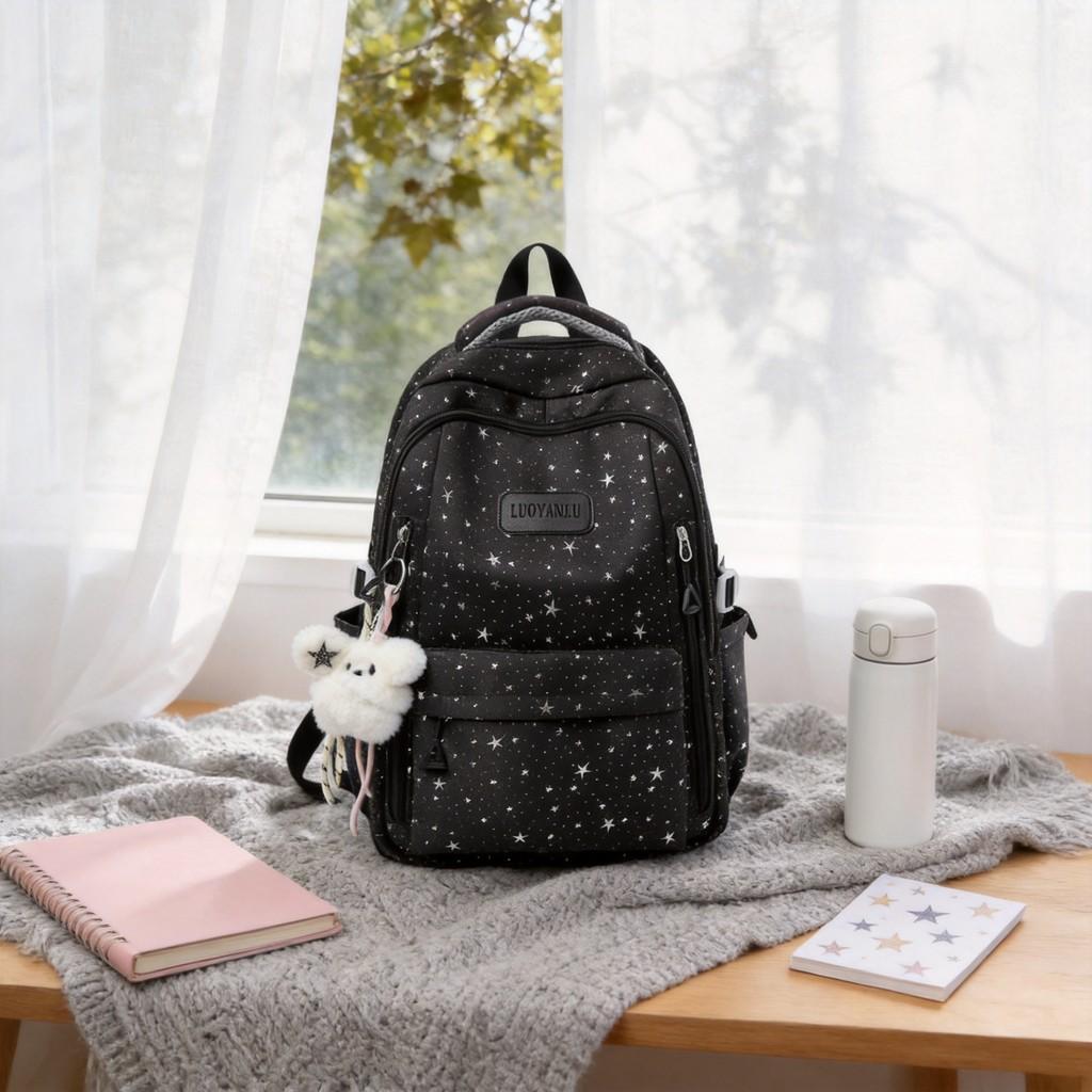 Schulrucksack im Sternen-Design für Mädchen aus Nylonmaterial mit Fach für einen 10-Zoll-Laptop