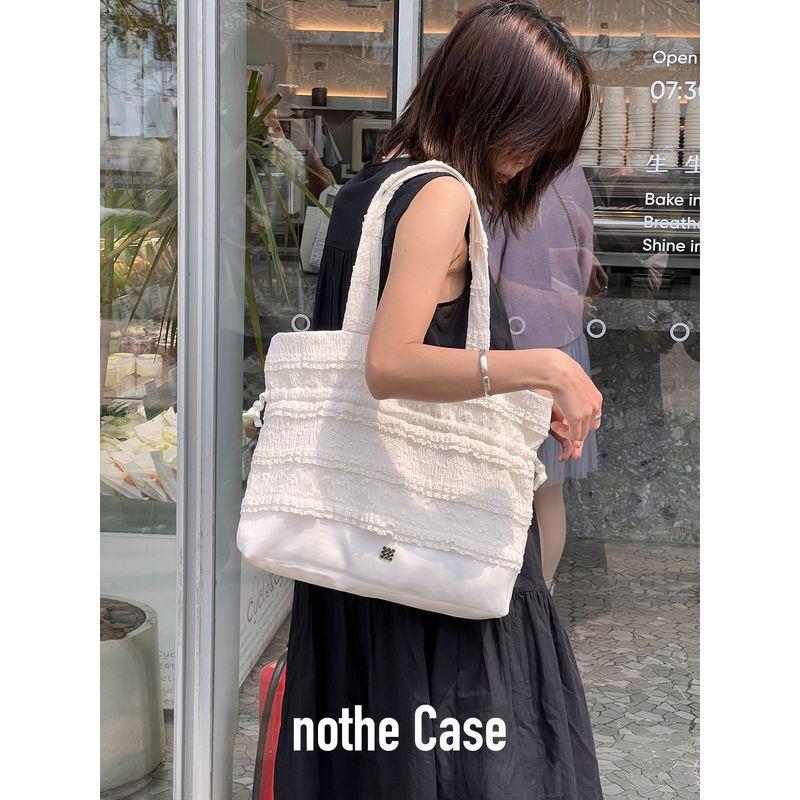 

Nothe Case Крем Банджи Шишка Кружево Шелковый Мешочек Закрытая Сумка-Тоут Нишевый Стиль На шнурке Расшитая бисером Тканевая Сумка на Плечо Cream pine In Stock