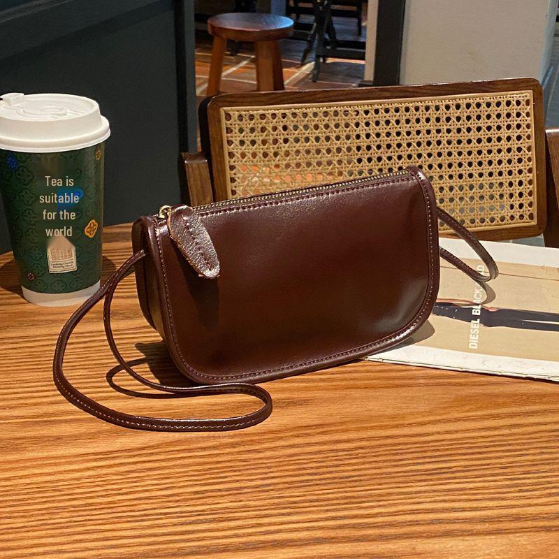 

Women s 2025 New Versatile Cowhide Mini Crossbody Dumpling Bag
