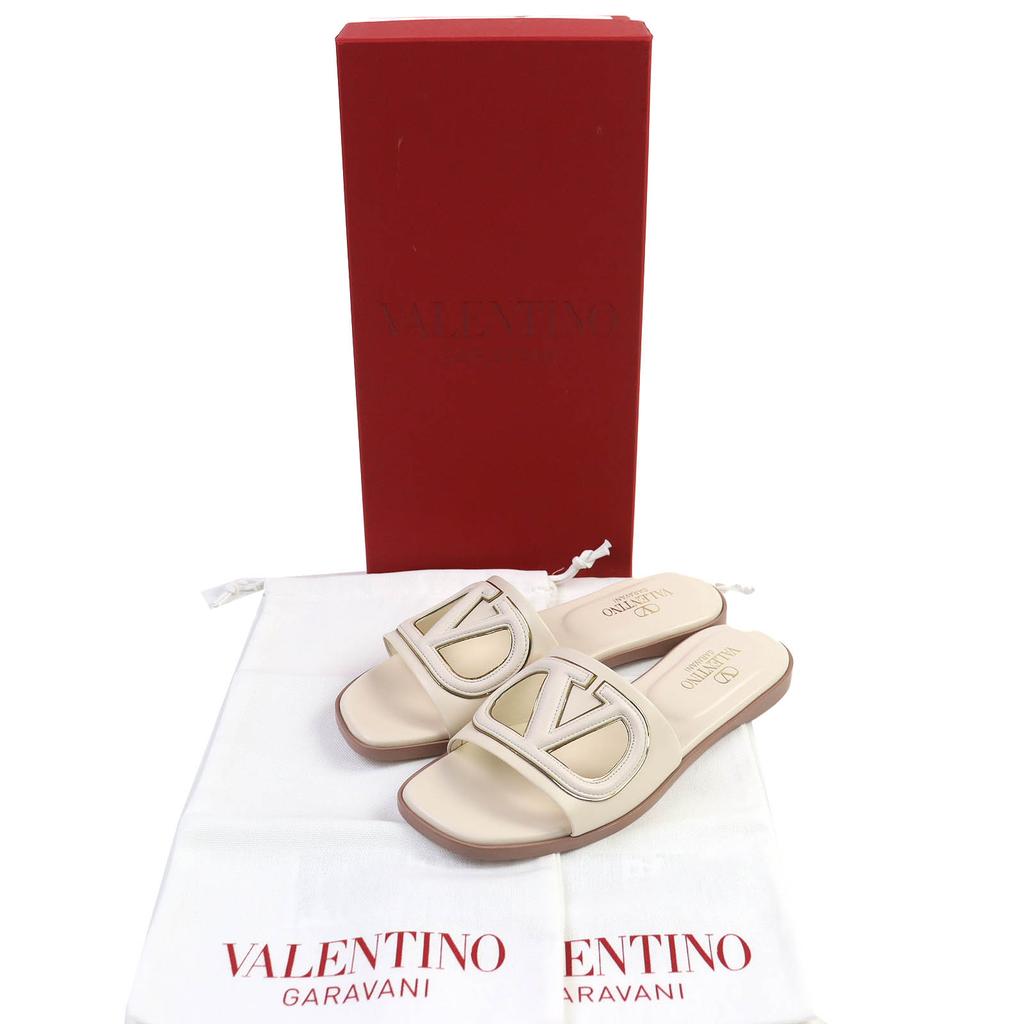 Nienaganne skórzane sandały klapki Valentino Garavani z wycięciem V Logo i kwadratowym noskiem 35 4W2S0IB0 Używane