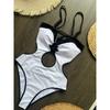 Nuevo Traje de Baño Patchwork Blanco y Negro para Mujer 2026 Bandeau de Estrella de Mar Hueco Espalda Descubierta Tanga Traje de Baño de Una Pieza Trajes de Baño de Playa